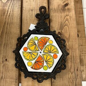 Vintage Cast Iron Trivet with ceramic tile